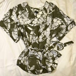 White and green flower blouse.